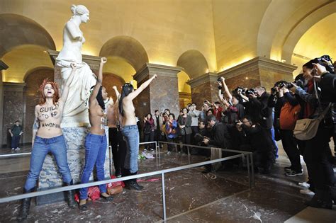 Topless Protest At The Louvre Half Naked Femen Campaigners In Paris