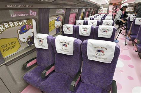 all aboard hello kitty bullet train debuts in japan abs cbn news