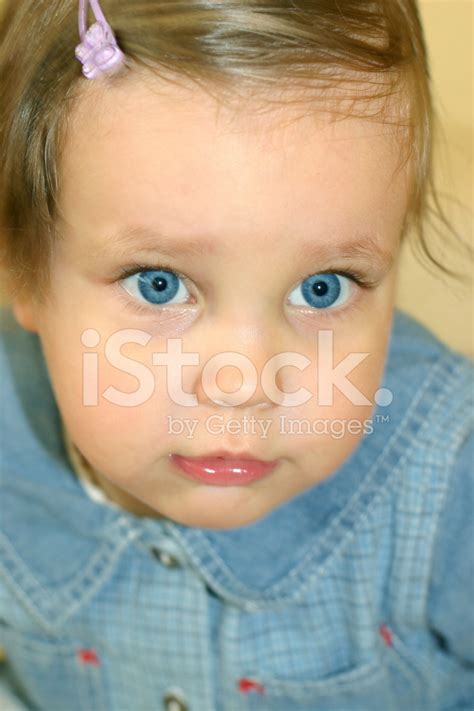 Young Boy With Big Blue Eyes Cuddling Stuffed Animals Hoodoo Wallpaper