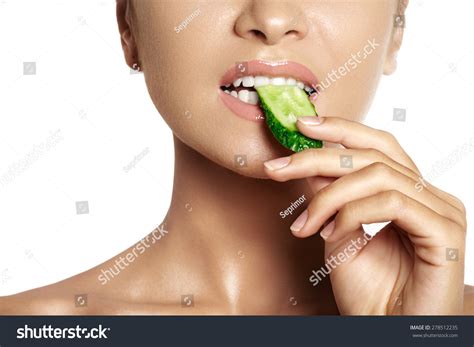 Happy Young Woman Eating Cucumber A Close Up Of Beautiful Girl Eating Cucumber Healthy Smile