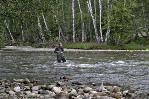 Fishing On The Mountain River Fishing Rod Fisherman Fishing In The