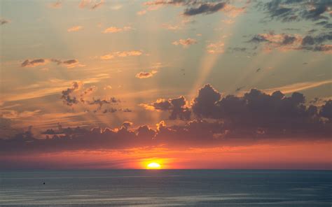 Download Wallpaper 3840x2400 Sun Sunset Horizon Sea Clouds 4k Ultra