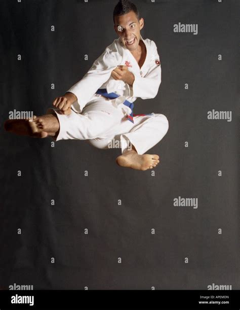 Martial Arts A Flying Side Kick Of Taekwondo Stock Photo Alamy