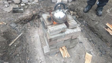 The stove is easy to assemble and is made out of 4 parts. Backyard rocket stove | Rocket stoves, Outdoor decor, Backyard