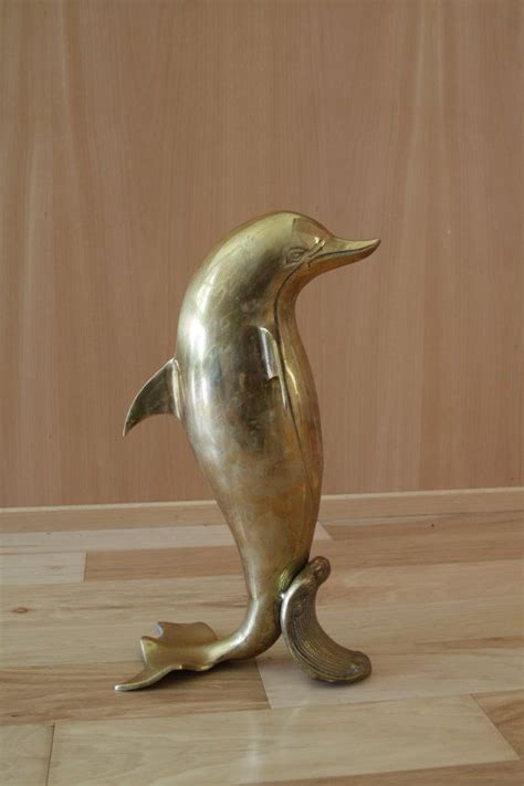 Dolphin Statues Items Similar To Brass Dolphin Figurine Statue