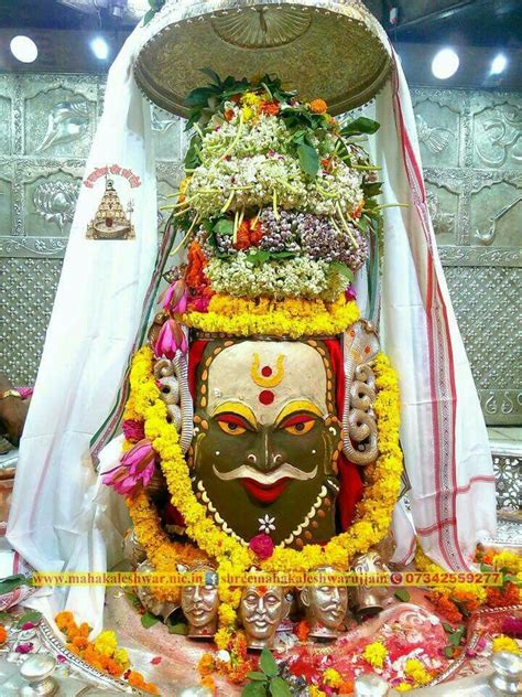 The mahakaleshwar temple at ujjain is located near a lake; 11 best Ujjain Mahakal Darshan HD Image Wallpaper images ...