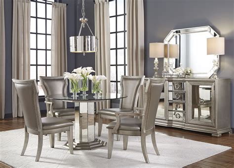 The gorgeous platinum finish and crystal accents bring stately style to this dashing dining room. Couture Silver Round Pedestal Dining Room Set from Pulaski ...