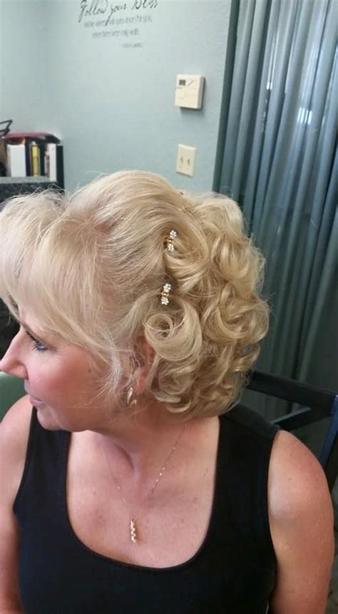 Here's our collection of short hairstyles for women over 50! Updo hair style for mother of the bride, by Melony Terry ...