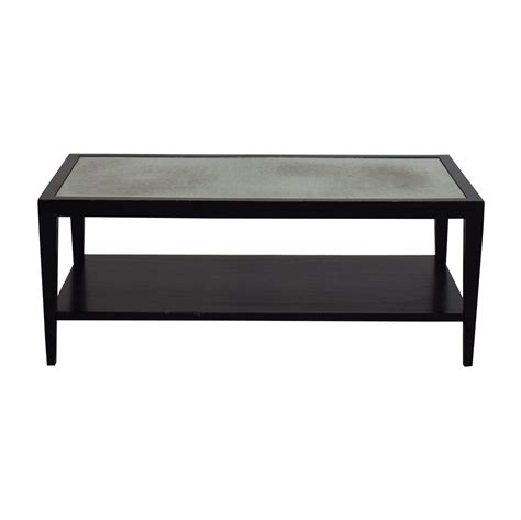 If you have a particularly soft rug, consider sitting on the ground around your table and using it for a game night or wine and cheese party. 76% OFF - Crate & Barrel Crate & Barrel Two Tiered Coffee ...
