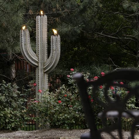 This steel art piece can be staked in the garden or you can use the included. Desert Steel Saguaro Cactus with Three Torches & Reviews ...