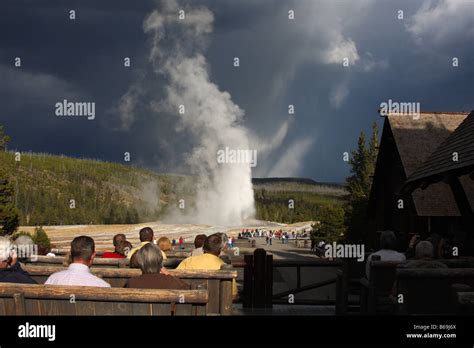 Watching Old Faithful Erupt From The Viewing Deck Of The Old Faithful