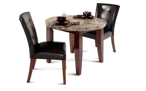 Mealtime should always be a pleasant and joyful event, which is why breaking bread with family and friends on a beautiful dining table transforms a meal into a very special experience. Montibello 40" Round 3 Piece Dining Set | Bob's Discount Furniture | Kitchen table settings ...
