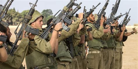 A former soldier who was videotaped by friends as he danced next to a blindfolded female terrorist has been threatened by hamas. Israeli Soldier With UK Links 'May Have Been Killed' In ...