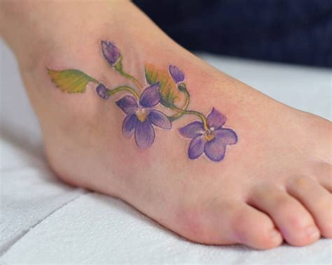 The whimsical style of the watercolor really captures the beauty of this meaningful flower. Image result for violet foot tattoo | Violet tattoo ...