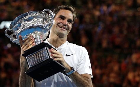 Download Roger Federer Grand Slam Trophy Wallpaper