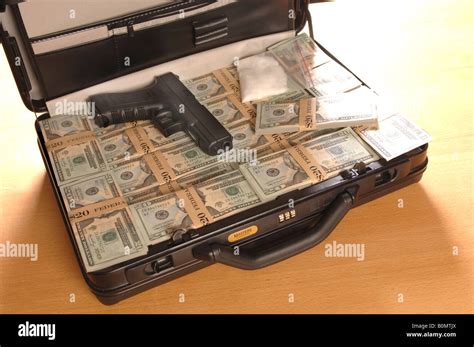 A Briefcase Full Of Money With A Gun And Some Drugs In It Replics Gun