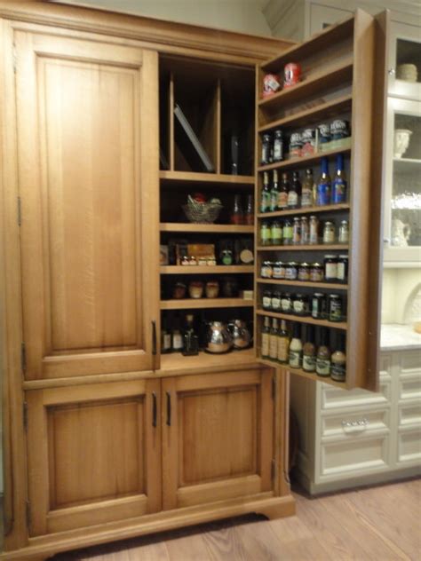Looking for small kitchen storage ideas? Where can I buy the stand alone armoire used for a pantry?