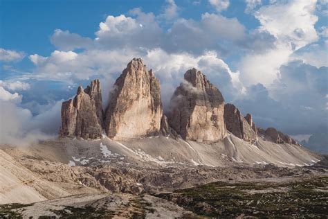 Clouds Floss Between The Three Peaks Of Lavaredo In The Dolomites