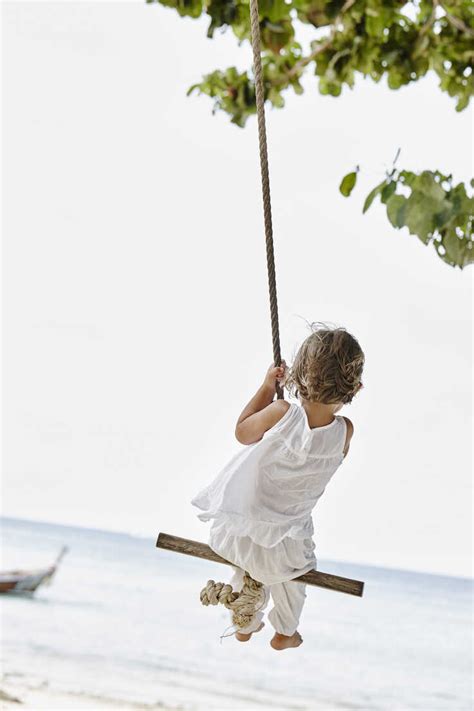 Thailand Phi Phi Islands Ko Phi Phi Little Girl On A Rope Swing On