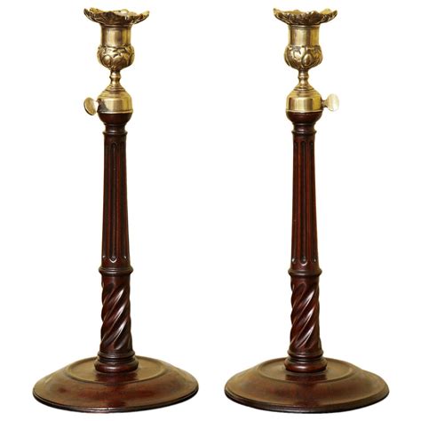Pair Of George Iii Mahogany Brass And Steel Candlesticks English