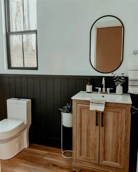 Half Bath With Black Vertical Shiplap Wainscoting Soul And Lane