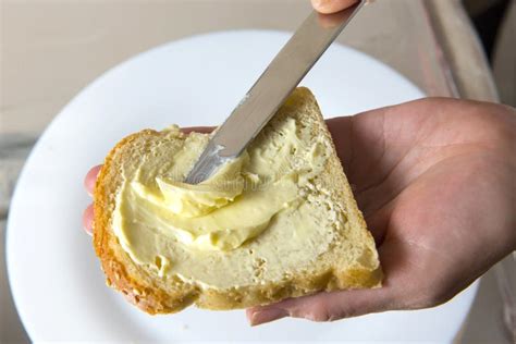Spread Butter On Bread Stock Photo Image Of Creamy