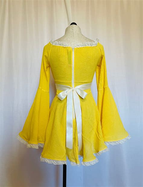 the katie mae dress in yellow malicious designs