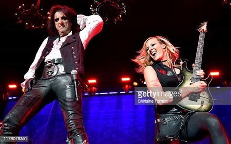 Alice Cooper And Nita Strauss Perform On Stage At Manchester Arena On