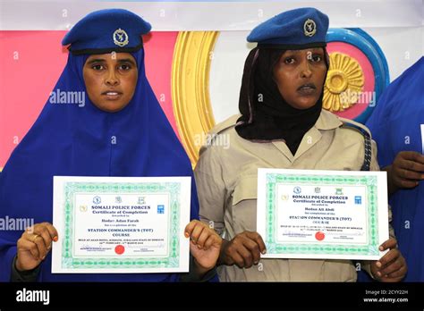 Female Somali Police Officers Display Their Certificates After Completing A Leadership And