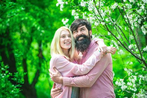 Couple In Love Embrace And Blow Dandelion Lovely Couple Embrace In