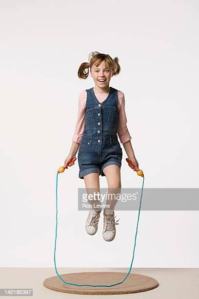 Young Girl Jumping Rope White Background Photos And Premium High Res