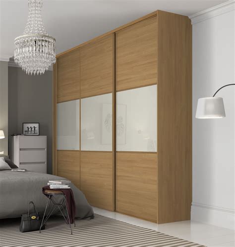 Wardrobe has one metal hanging rail, metal handles, one large and 3 floating shelves to adjust them to your convenience. Beautiful, classic three panel sliding wardrobe doors in ...