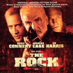 In general, when someone refers to a film score they almost always mean the actual music composed for the film however, when referring to a soundtrack they could mean the score and/or the songs from a film. The Rock Soundtrack (1996)