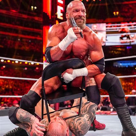 Photos Triple H And Batista Battle In Brutal Bout Wrestlemania 35