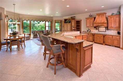 If your counters and kitchen flooring are the same, the space could start to look very samey unless you throw in some kitchen cabinets of a contrasting color to break up the monotone color scheme. What Color Countertops Goes With Maple Cabinets - Home Decor Bliss