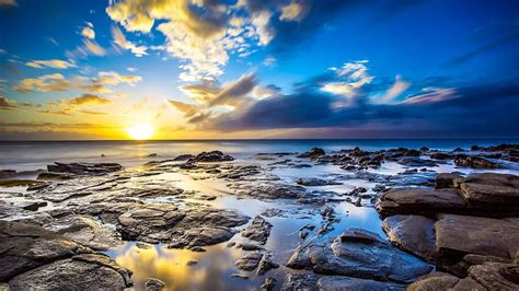 Spectacular Ocean Sunrise In Hawaii Rocks Shore Sunrise Clouds Sea