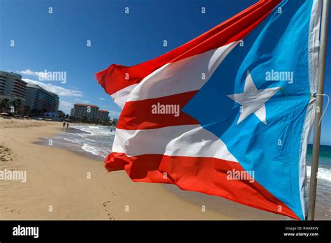 A Puerto Rican Flag Flying On The Beach In Condado San Juan Puerto