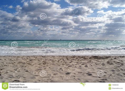 Sea Miami At The Background Of Blue Sky Clouds Waves Stock Image