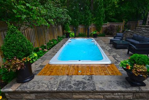 Hydropool Swim Spa Installed Into A Stone Deck Notice The Wood Hatch