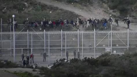 Migrants Storm Border Fence In Spanish Enclave Of Ceuta Bbc News