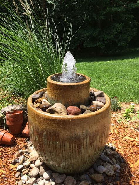 The terra cotta material gives the homemade water fountain a natural look so it blends in well with any surrounding landscape. Solar Fountain Decks #SolarFountain #Diysolarfountainideas ...