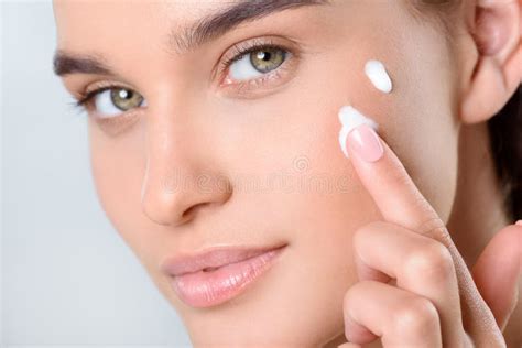 Woman Applying Face Cream Stock Photo Image Of Lips 109813102