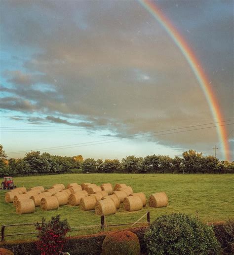 A Beautiful Rainbow Over The Fields Nature Rainbow Weather Rainbows