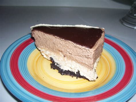 This double layer peanut butter chocolate mousse pie starts with a buttery oreo crust. Oven Delights: Chocolate Peanut Butter Mousse Cake