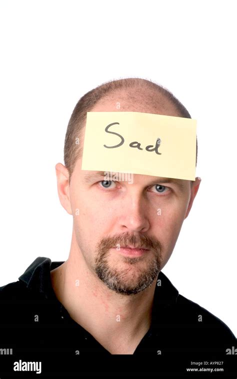 Happy Face Man With Post It Note On Head Representing Depression Stock