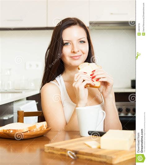Woman Having Breakfast At Kitchen Stock Image Image Of Female Butter
