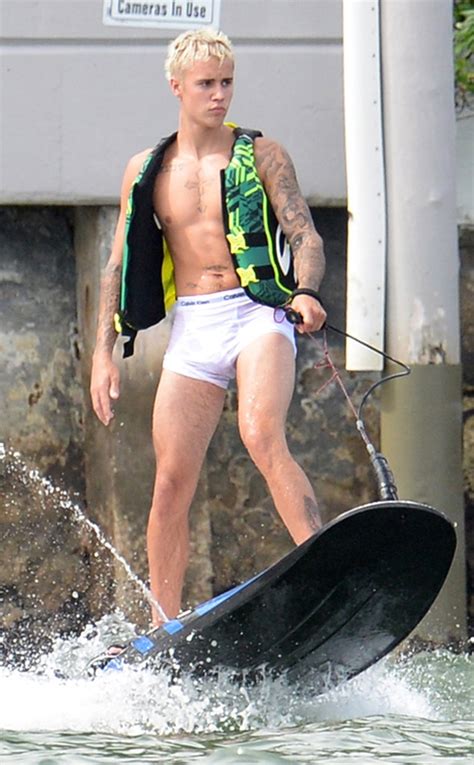 Justin Bieber Strips Down To His Wet Calvin Klein Underwear To