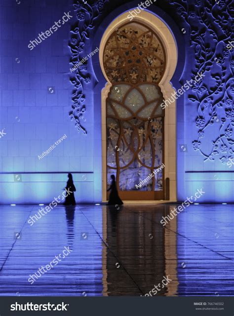 Muslim Womans Black Attire Inside Mosque Stock Photo