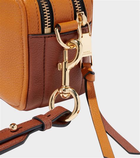 Enter your zip code to see delivery availability. Marc Jacobs The Softshot 21 Crossbody Bag Brown - dr. Adams