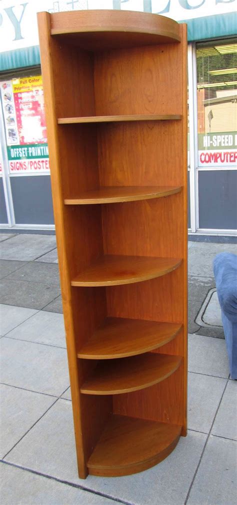 This single piece of furniture not only gives you an easy access to a myriad of your favorite books but also helps in accentuating your small living space. UHURU FURNITURE & COLLECTIBLES: SOLD Tall Corner Bookcase ...